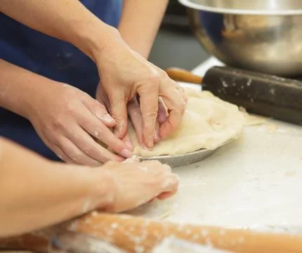 Preparing and making apple pies Stock Photos