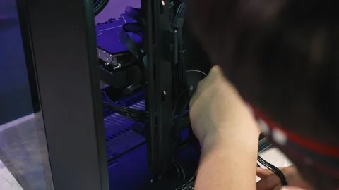 Preparing and routing power cables before component connection Stock Footage 340883130