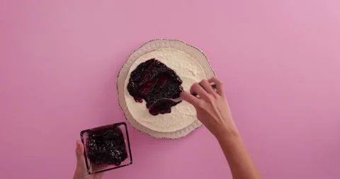 Preparing and serving a cheesecake Video stock 133819876