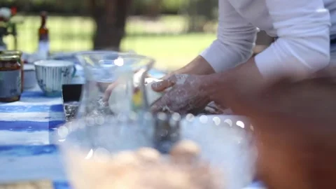 Preparing and serving focaccia bread prosciutto, dried tomatoes, black olive Video stock 133748695