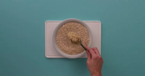 Preparing and serving quinoa burger Stock Footage 132145762