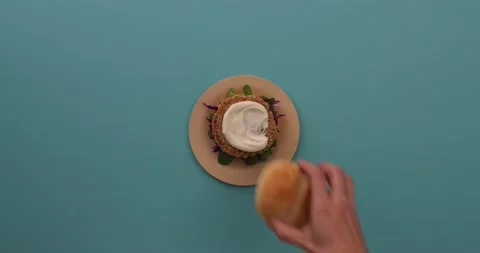 Preparing and serving quinoa burger Stock Footage 132145910