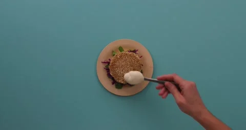 Preparing and serving quinoa burger Stock Footage 132145931