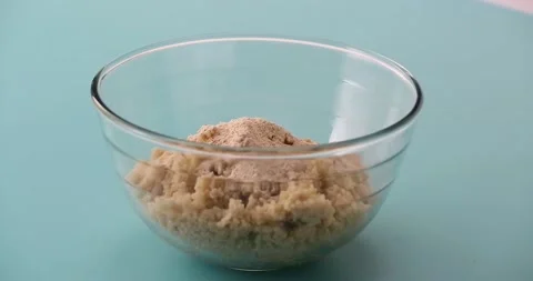Preparing and serving quinoa burger Stock Footage 132146000