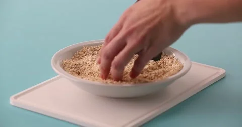 Preparing and serving quinoa burger Stock Footage 132146063