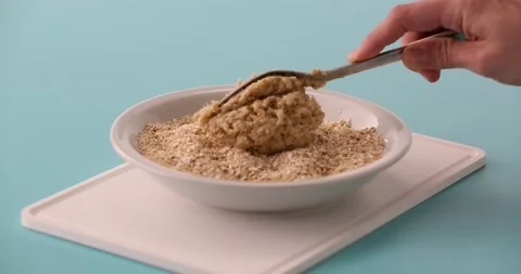 Preparing and serving quinoa burger Stock Footage 132146092