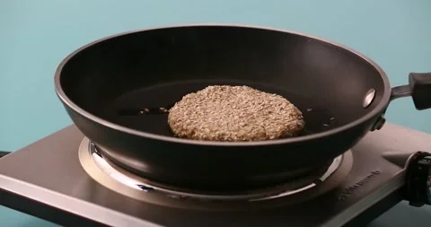 Preparing and serving quinoa burger Stock Footage 132146153
