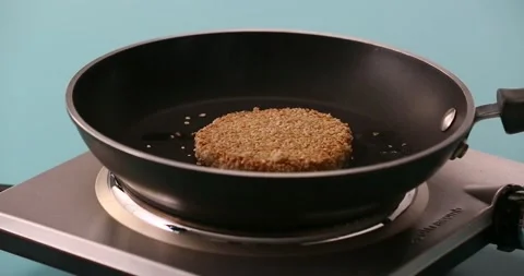 Preparing and serving quinoa burger Stock Footage 132146161