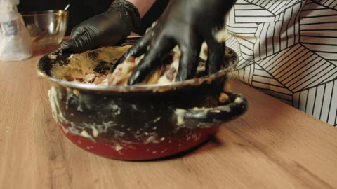 Preparing and shaping dough with raisin for baking process Stock Footage 330536817