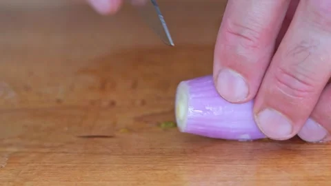 Preparing and slicing raw onions for pizza or salad. Close-up macro shots i.. Video stock 281327265