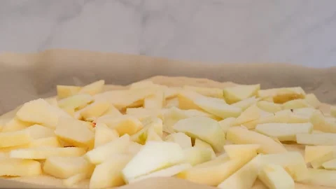 Preparing apple pie. German Apple Pie with Streusel Stock Footage 285425025