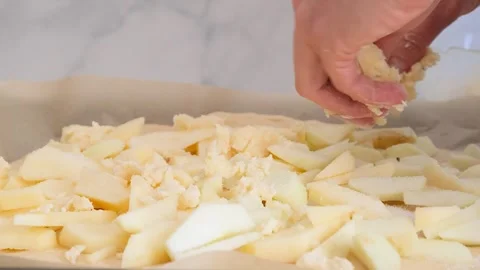 Preparing apple pie. German Apple Pie with Streusel Stock Footage 285425048