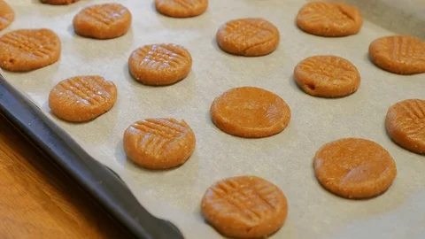 Preparing arranging cookie dough before baking process. Stock Footage 81861472