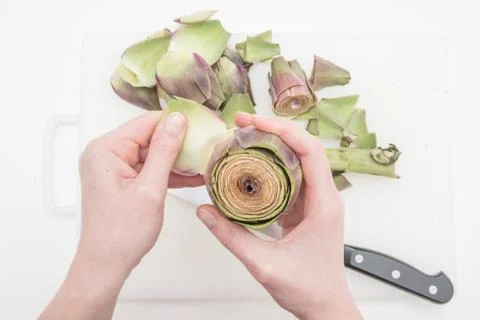 Preparing the artichoke Stock Photos