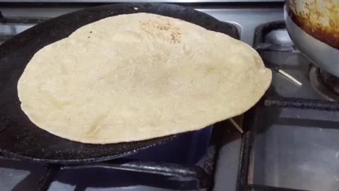 Preparing Asian bread chappati  動画素材 247921080