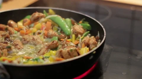 Preparing asian vegetable meal in a pan Stock Footage 49663112