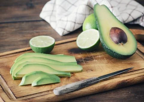 Preparing avocado sandwich in the kitchen Stock Photos