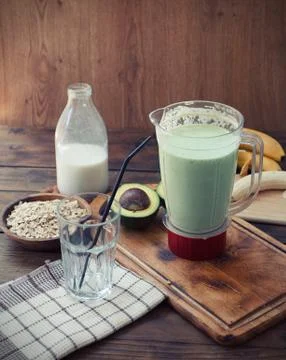 Preparing avocado smoothie Stock Photos