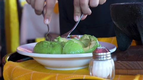 Preparing the avocados for guacamole  Video stock 294892879