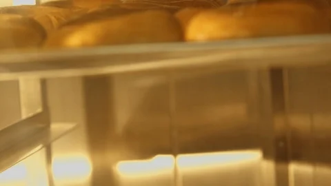 Preparing &amp; Baking Delicious New York Style Bagels In A Cafe Bakery Deli Stock Footage 123674129