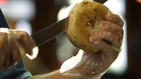 Preparing &amp; Baking Delicious New York Style Bagels In A Cafe Bakery Deli Stock Footage 123674213