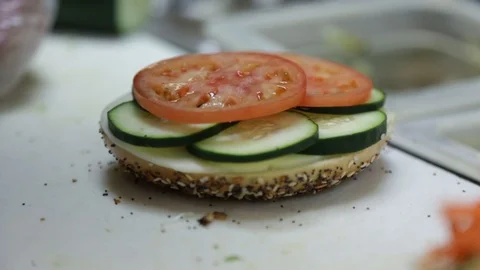 Preparing &amp; Baking Delicious New York Style Bagels In A Cafe Bakery Deli Stock Footage 123674255