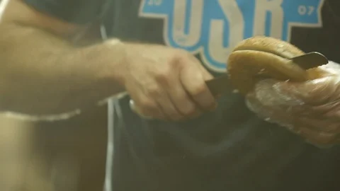 Preparing &amp; Baking Delicious New York Style Bagels In A Cafe Bakery Deli Stock Footage 123674277
