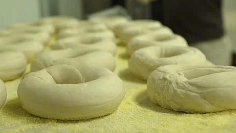 Preparing &amp; Baking Delicious New York Style Bagels In A Cafe Bakery Deli Stock Footage 123674831