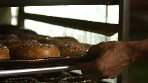 Preparing &amp; Baking Delicious New York Style Bagels In A Cafe Bakery Deli Stock Footage 123674996