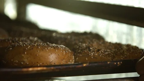 Preparing &amp; Baking Delicious New York Style Bagels In A Cafe Bakery Deli Stock Footage 123675043