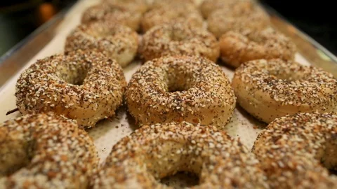 Preparing &amp; Baking Delicious New York Style Bagels In A Cafe Bakery Deli Stock Footage 123675076
