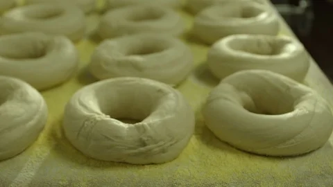 Preparing &amp; Baking Delicious New York Style Bagels In A Cafe Bakery Deli Stock Footage 123675082