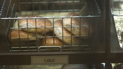 Preparing &amp; Baking Delicious New York Style Bagels In A Cafe Bakery Deli Stock Footage 123675155