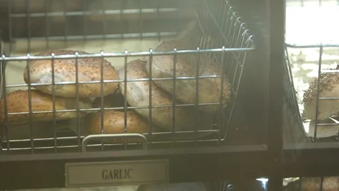Preparing &amp; Baking Delicious New York Style Bagels In A Cafe Bakery Deli Stock Footage 123675197