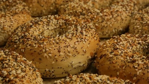 Preparing &amp; Baking Delicious New York Style Bagels In A Cafe Bakery Deli Stock Footage 123675229