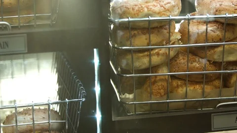Preparing &amp; Baking Delicious New York Style Bagels In A Cafe Bakery Deli Stock Footage 123675266