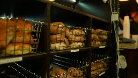 Preparing &amp; Baking Delicious New York Style Bagels In A Cafe Bakery Deli Stock Footage 123675268