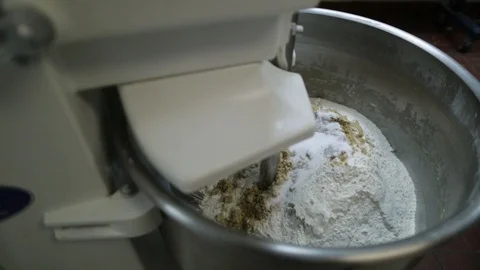 Preparing &amp; Baking Delicious New York Style Bagels In A Cafe Bakery Deli Stock Footage 123878537