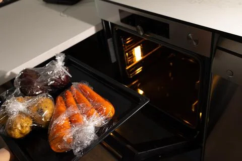 Preparing Baking Sleeve Vegetables for an Alternative Cooking Method at Home Stock Photos