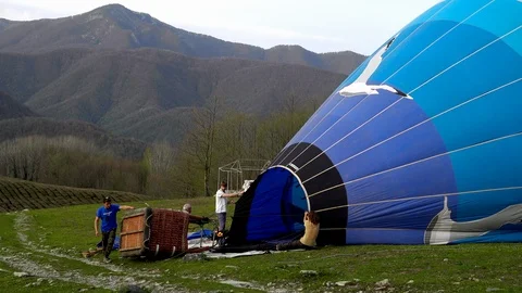Preparing a balloon for flight Stock Footage 111920433