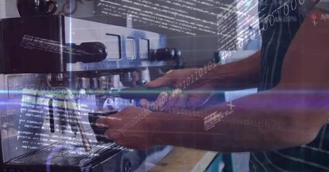 Preparing barista pulling shot at cafe counter, wearing striped apron, 库存照片