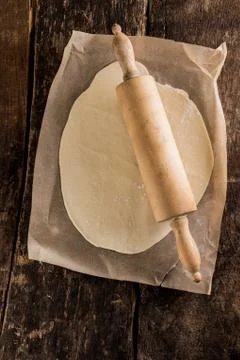 Preparing the base for an italian pizza Stock Photos