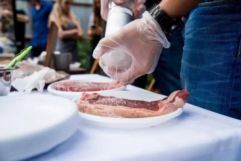 Preparing beef steak Stock Photos
