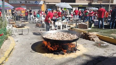 Preparing a Big Paella in Spain Stock Footage 104761531