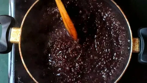 Preparing black sticky rice. Stock Footage 203901881