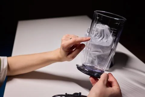 Preparing blender on kitchen counter, Scene shows detailed process of assembling Stock Photos