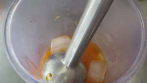 Preparing Blender Smoothie with a Mixer Stock Footage 92360804