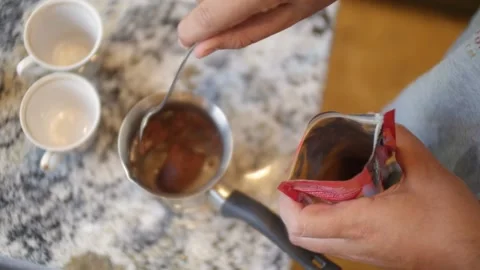 Preparing to Boil Coffee in a Turk - second step Video stock 219019519