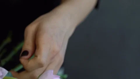 Preparing a bouquet of flowers Stock Footage 107151654
