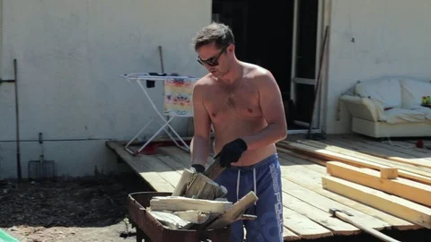 Preparing the brazier for a fire. Stock Footage 90343373